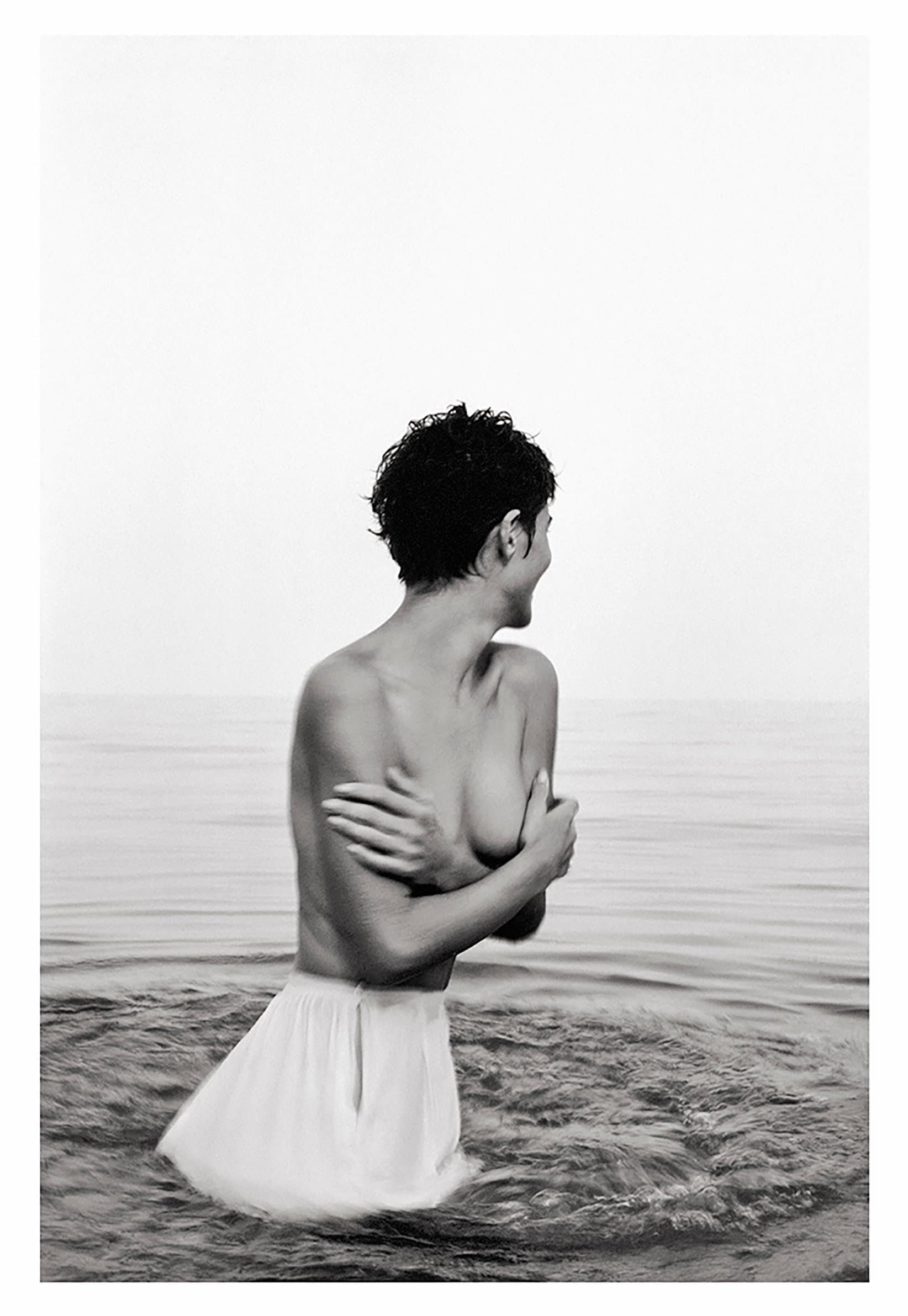 Portrait of a woman standing in the sea